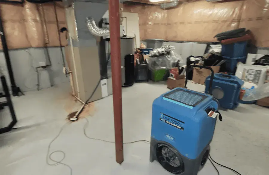 Dehumidifier running in a lower level during structural drying